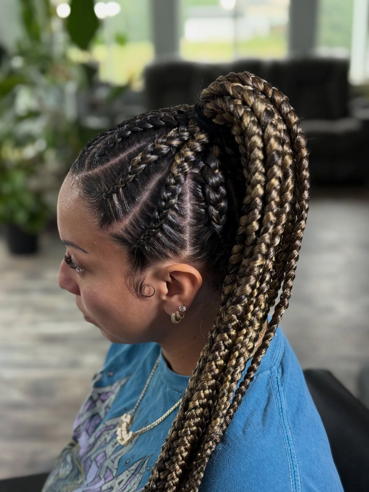 12 Braids Hairstyles: 29 Ideas, From Box Braids to Milkmaid 8 Woman with blonde and brown cornrows gathered into a high braided ponytail.