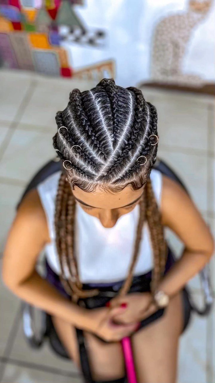 12 Braids Hairstyles: 29 Ideas, From Box Braids to Milkmaid 13 Woman with thick Ghana braids featuring gold ring accessories and long extensions.