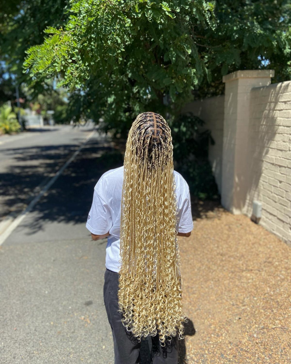 12 Braids Hairstyles: 29 Ideas, From Box Braids to Milkmaid 24 Long blonde goddess braids with curly tendrils cascading down a person's back.