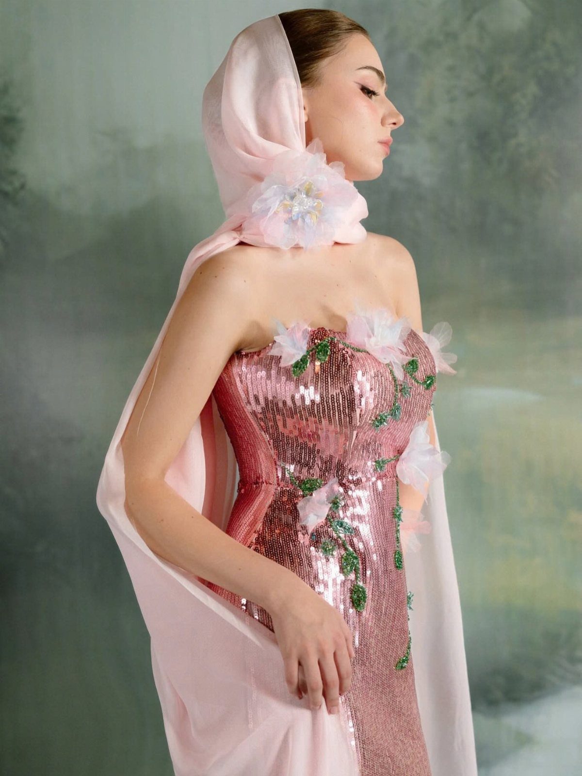 25 Blush Wedding Dress Ideas in Lace, Tulle, Silk and Sequins 21 Woman in a shimmering blush pink sequined gown with a matching head wrap.