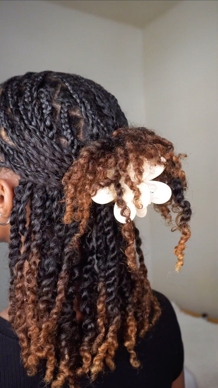 11 Clip Up Hairstyles From French Twists to Half-Up Buns 11 Twisted braids gathered in a half-up style secured with a white flower clip.