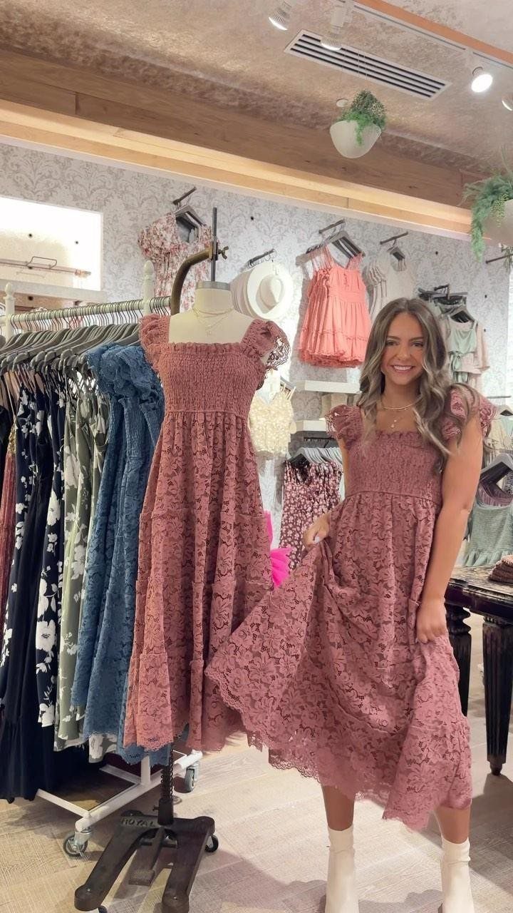 Formal Casual Dresses: 20 Ideas From Shirt Dresses to Velvet 15 Woman and mannequin wearing mauve lace midi dresses in a boutique clothing store