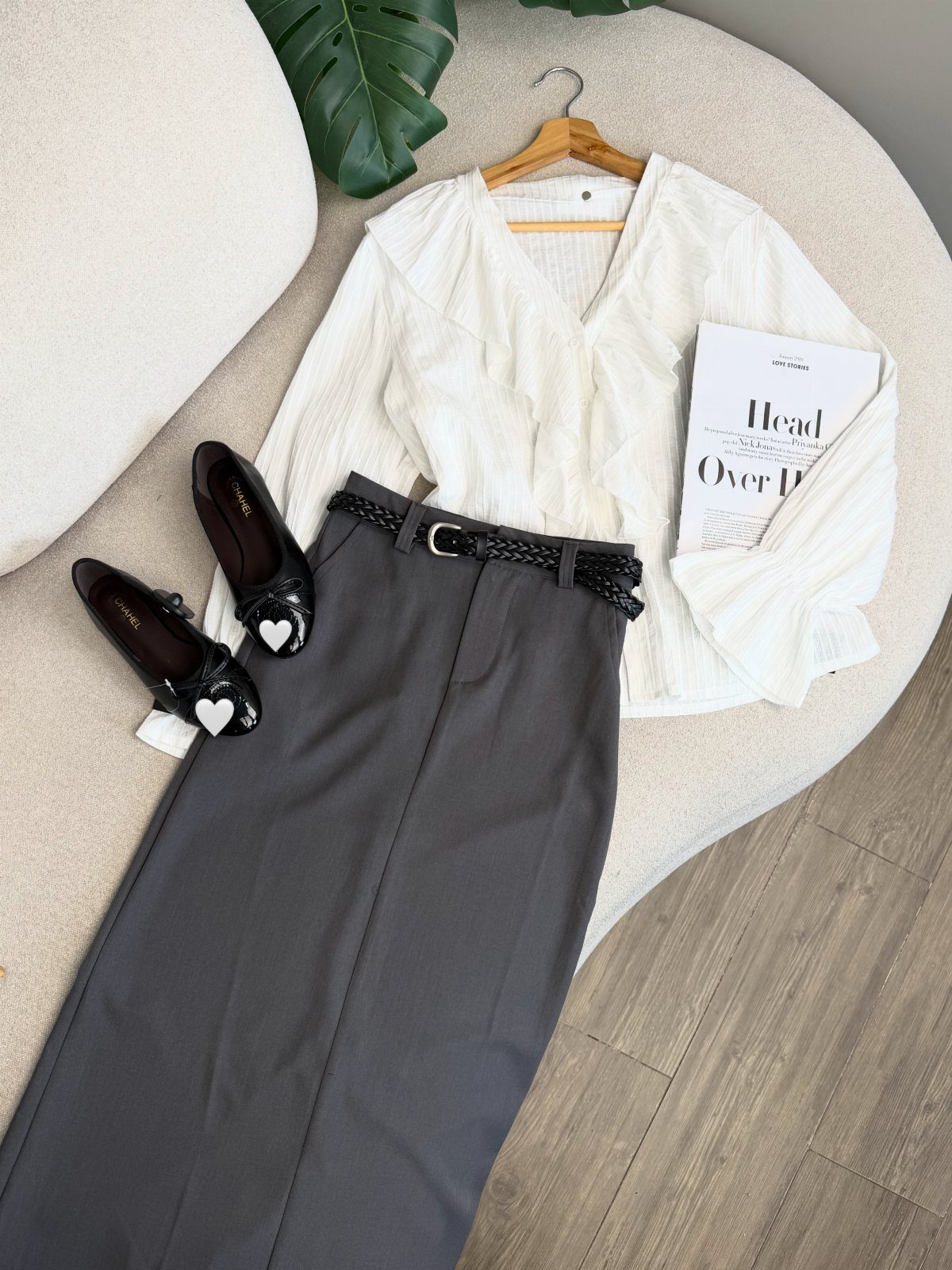 18 Gray Skirt Outfit Ideas From Mini to Maxi and Satin 18 Gray skirt paired with a white ruffled blouse and black heart loafers.