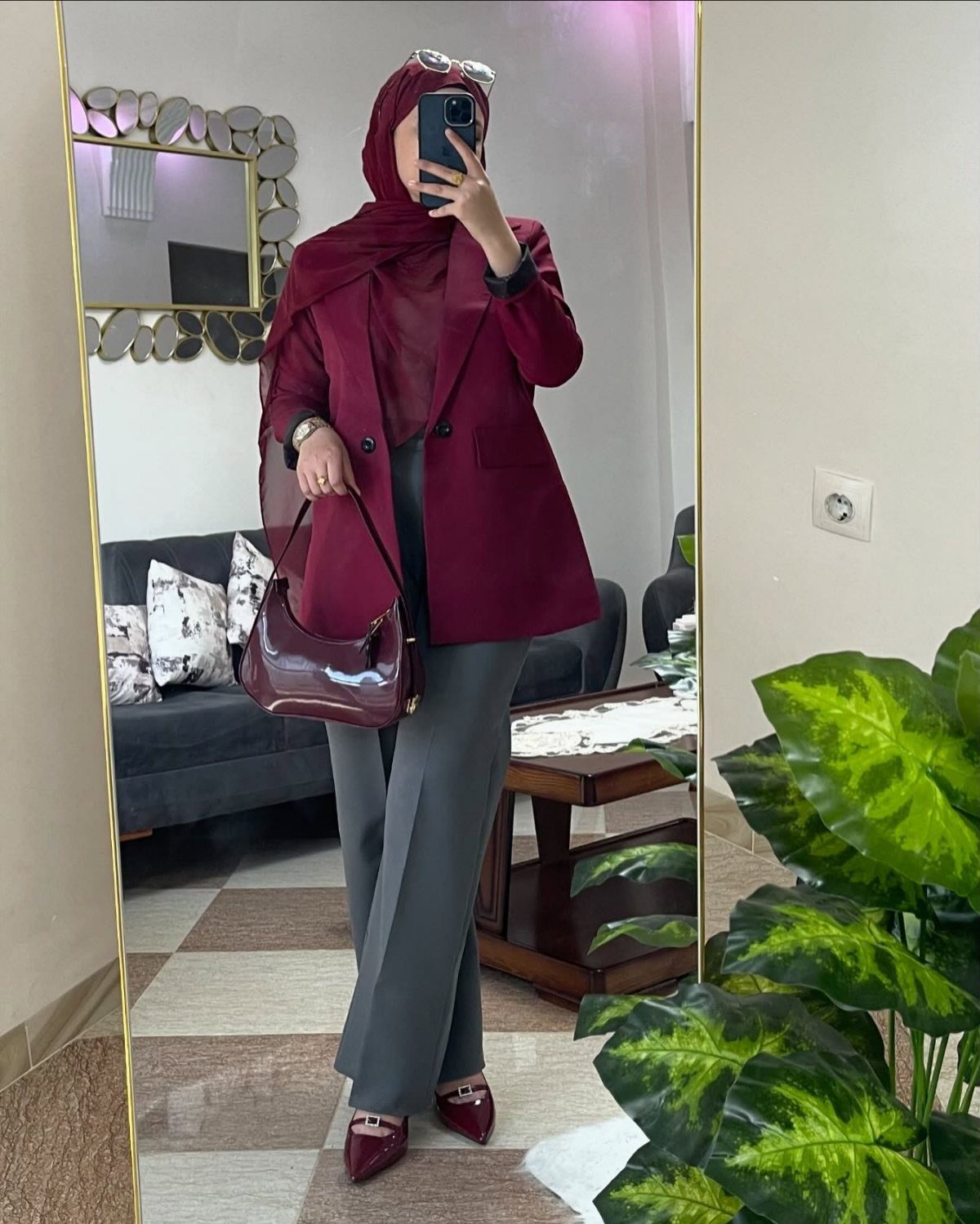 10 Grey Dress Pants Outfit Ideas for Work and Weekends 4 Person in red blazer and grey wide-leg pants posing for a mirror selfie.