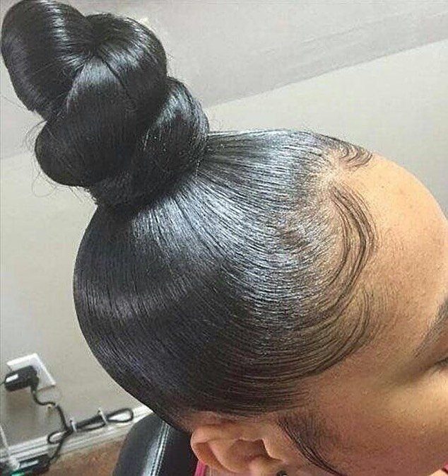 12 Hairstyles to Hide Bangs, From Quick Sweeps to Sleek Buns 7 Sleek high bun hairstyle pulling all hair back from the forehead and face
