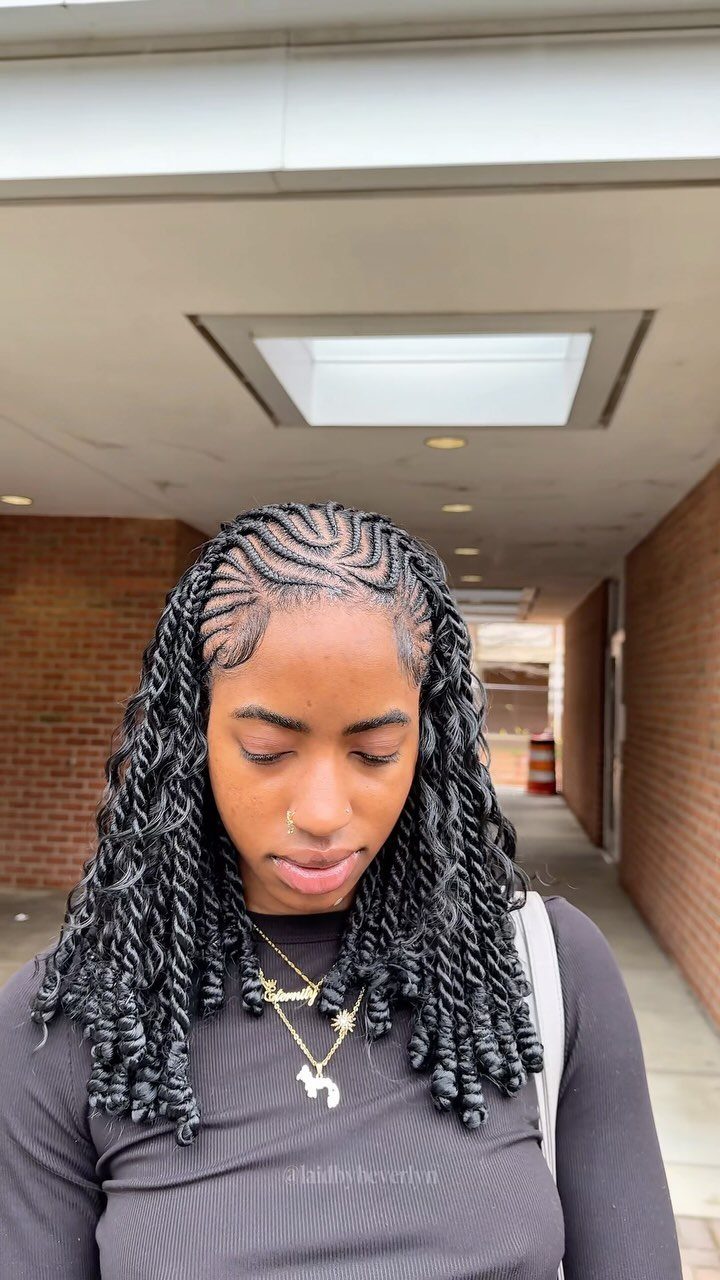 7 Half Braid Half Curly Hairstyles for Braids Mixed With Curls 5 Woman with cornrows on top and long curly twists flowing down her shoulders.