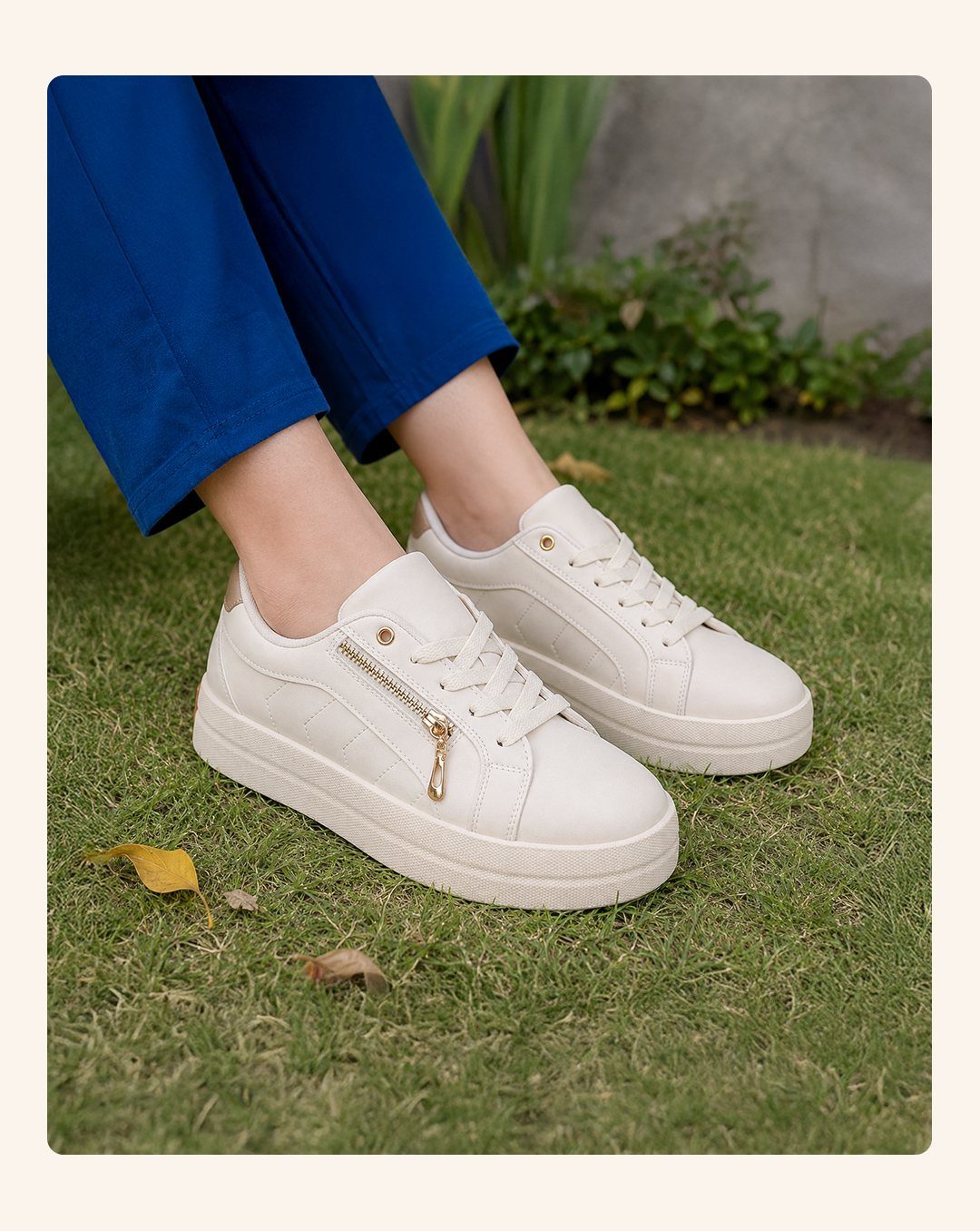 Semi Casual Clothes: 31 Outfit Ideas From Dresses to Loafers 29 Off-white platform sneakers with gold zippers paired with bright blue tailored trousers on grass.